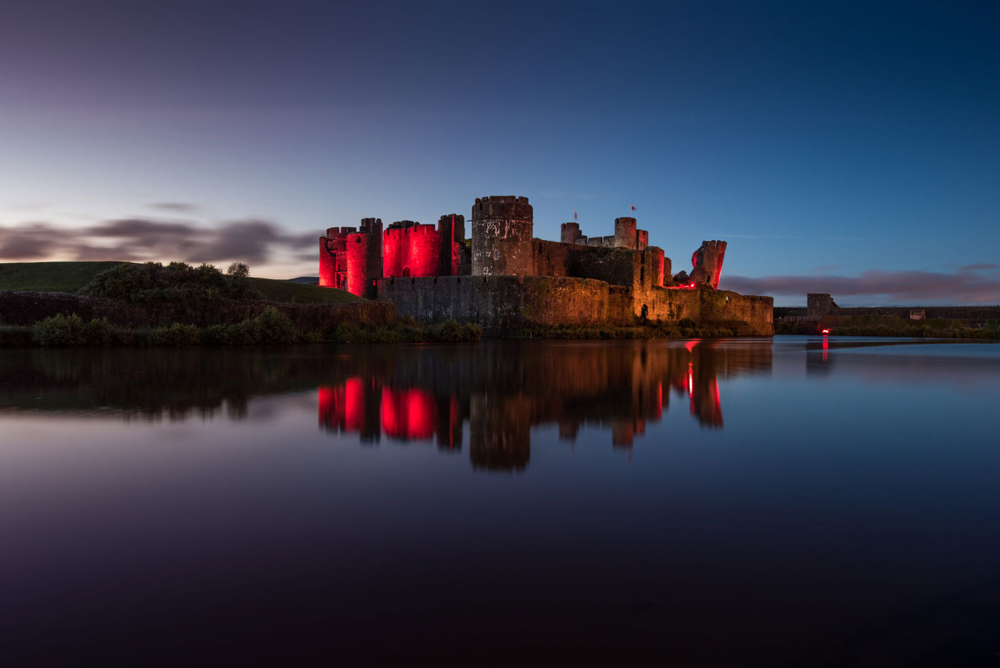 A photo of Caerphilly Castle at dusk